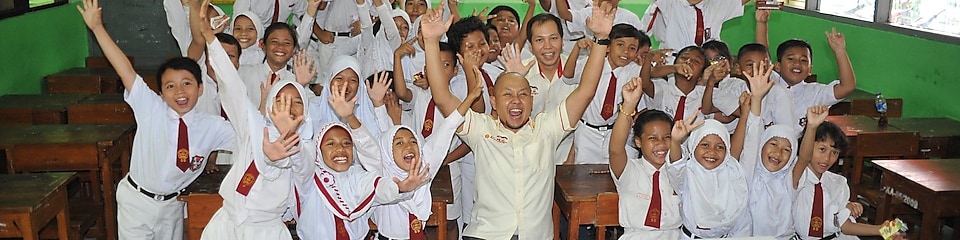 Students in a classroom cheering