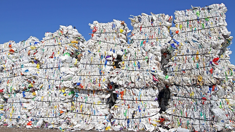 Stacks of plastic bags in a waste facility