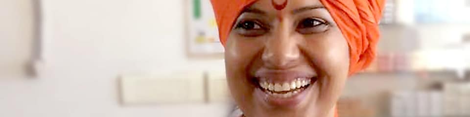 Debanjali smiling in Shell uniform