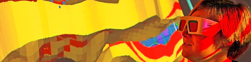 lady wtaching screen with 3d glasses