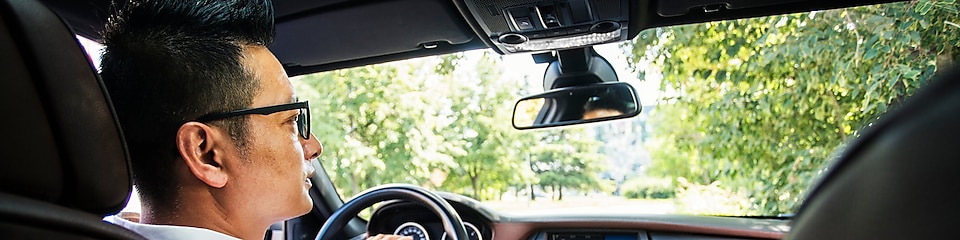 Businessman driving a car