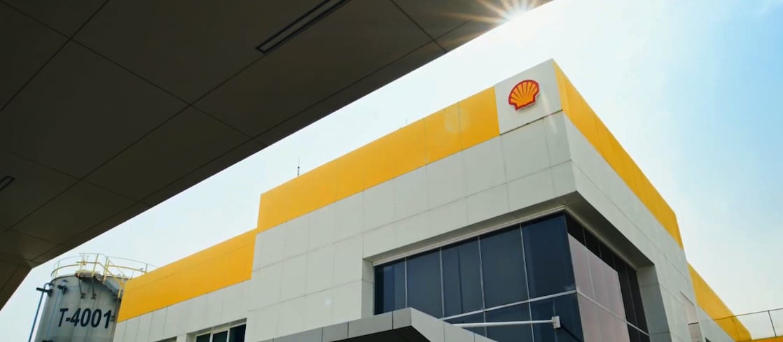 Exterior view of the Shell lubricants factory in Marunda with the Shell logo on the building