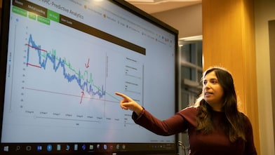 Women looking at computer screen
