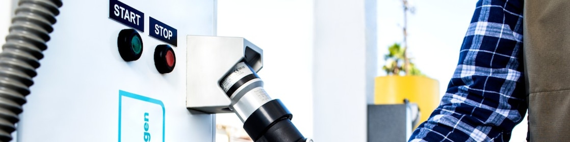 Man holding fuel pump