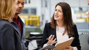 Manager discussing with colleagues