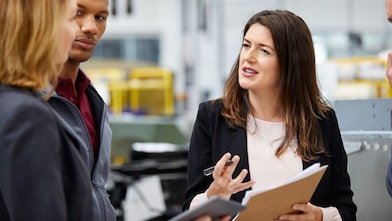 Manager discussing with colleagues