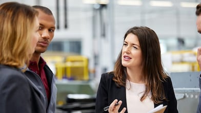 Manager discussing with colleagues