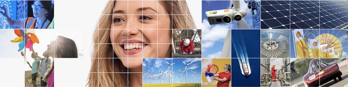 Seorang wanita berdiri di atas gunung membawa tas