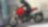 Pria mengendarai sepeda motor yang menggunakan Pelumas Mesin Unggulan untuk Sepeda Motor